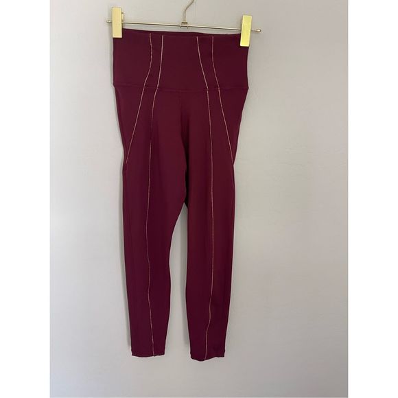 Nike Pants - NIKE Yoga Dri-FIT lurex tape 7/8 high-waisted leggings in burgundy Size Small
